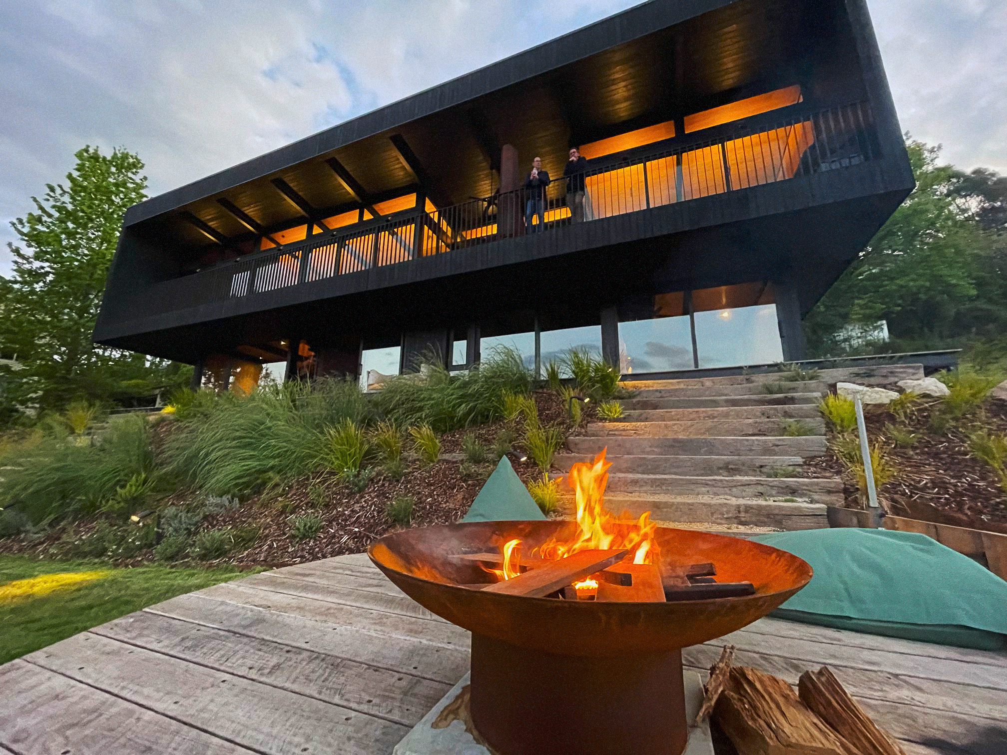 Bright House Residence backyard with firepit